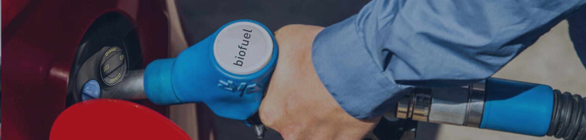 man filling his tank with AdBlue alternative fuel