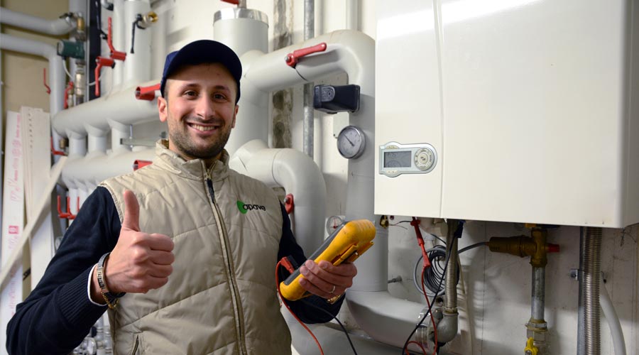 technician working in front of an electrical panel