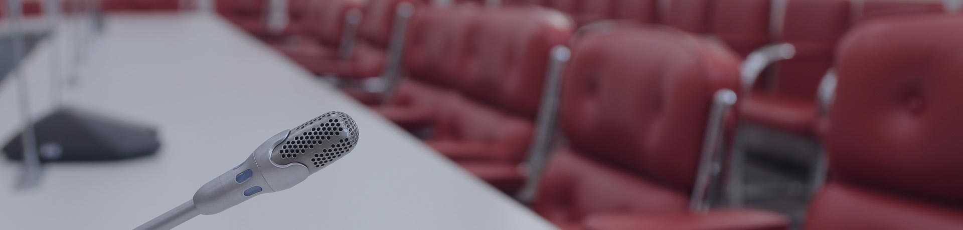 Meeting room with chairs and microphones