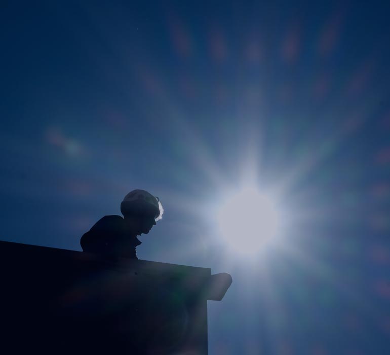 Helmeted man on a construction site